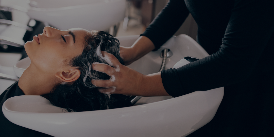 Modern salon shampoo unit with an ergonomic design, comfortable reclining seat, and professional wash basin for an elevated client experience.
