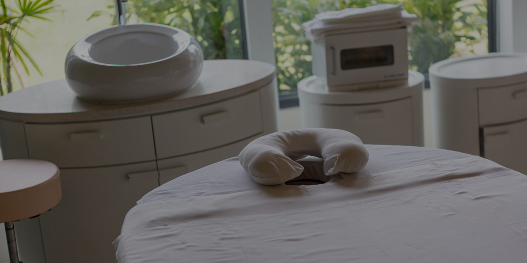 Professional face cradle and pillow accessories designed to provide comfortable head and neck support during massage and spa treatments.