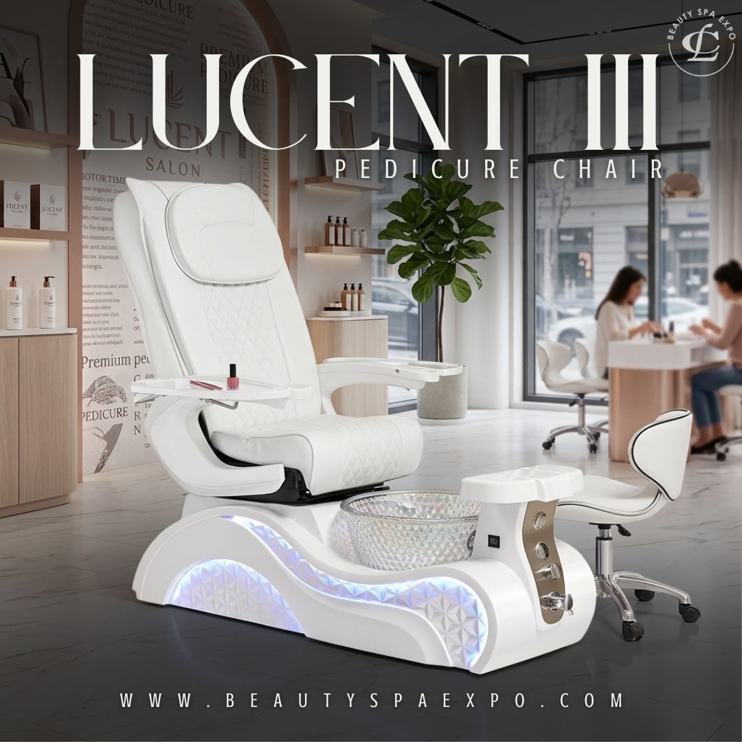 Lucent III Pedicure Chair in white quilted upholstery with illuminated LED base, glass basin, adjustable footrest, and matching technician stool.