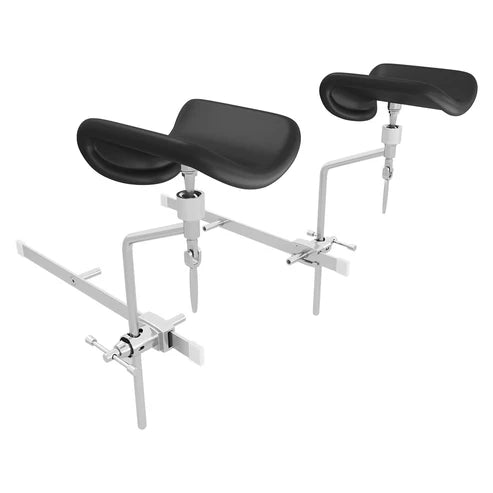 DIR OB/GYN stirrups with rail system for medical exam chairs and procedure tables. Features stainless steel articulating bars and black padded memory foam leg rests on a white background.