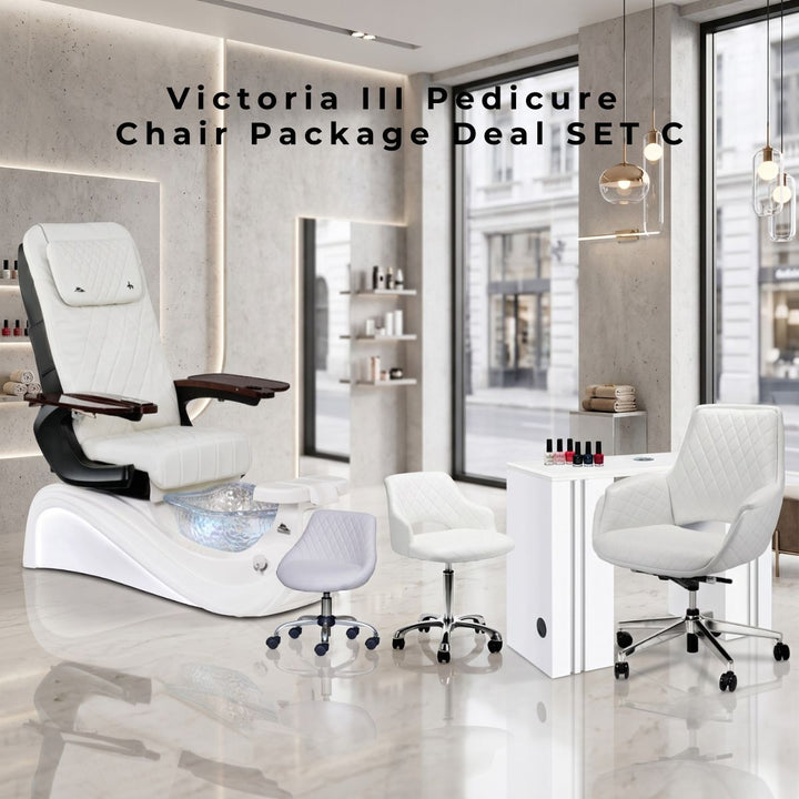 Whale Spa Victoria III Pedicure Chair Package Deal Set C featuring a white diamond-quilted vegan leather spa chair, a matching white manicure table, a client chair, and ergonomic technician stools in a modern luxury salon interior.
