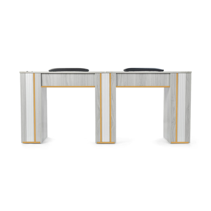 Modern desk with marble-like finish and gold accents on a white background
