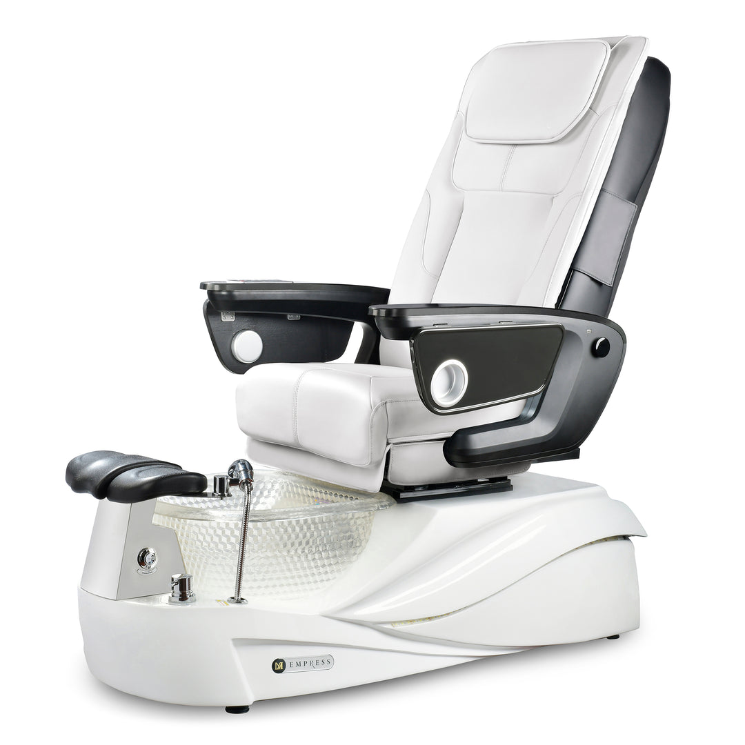 A modern pedicure chair with black leather upholstery, featuring a resin bowl, built-in remote control, and USB charging port.