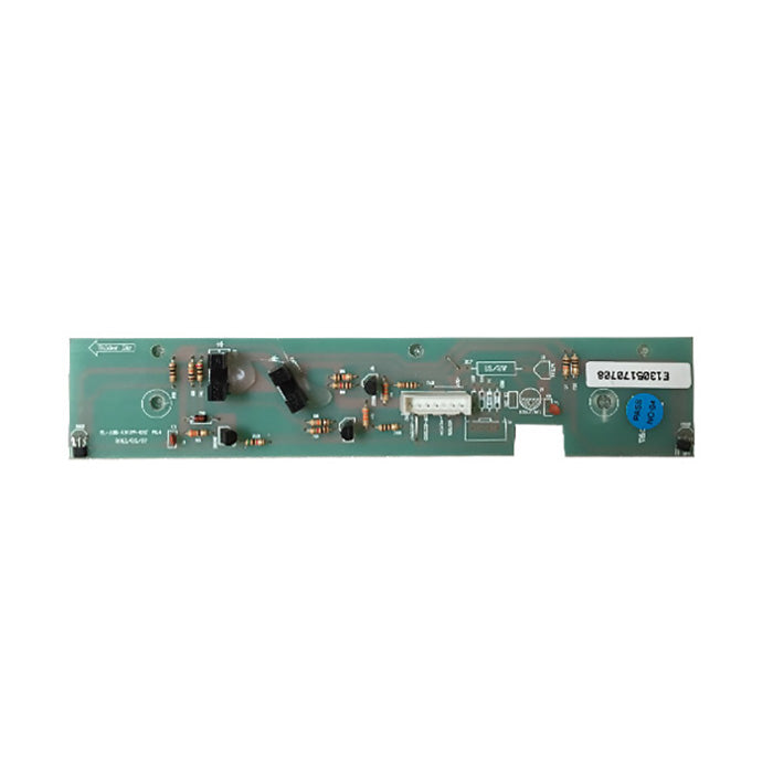 A green printed circuit board (PCB) with various electronic components, a white label with a barcode, and a blue connector, shown against a plain white background.