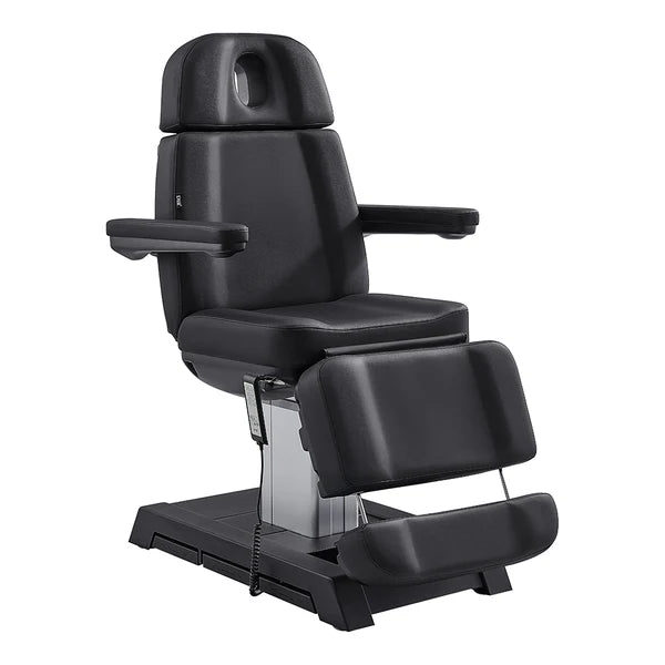 All-Black electric facial bed and medical spa chair by DIR, featuring adjustable headrest, armrests, leg extension, and a handheld remote control.