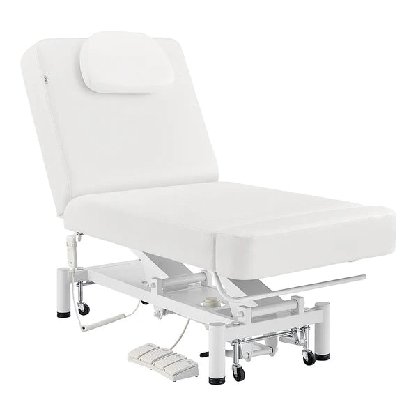 White WellRelax 2-motor electric therapy treatment table with adjusted backrest, tilting cradle pillow, hand remote, and foot pedal controls.